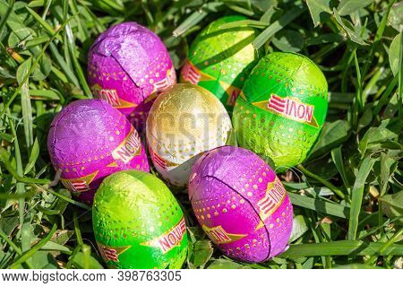 Primelin - France, April 18, 2017 : Chocolate Eggs Novi In Grass For Easter