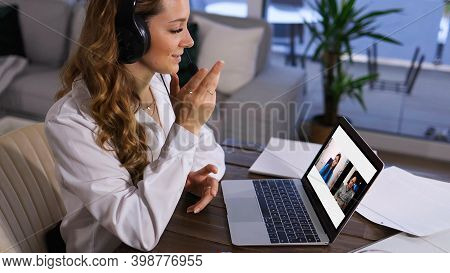 Young Woman At Home Does A Video Chat With Her Friend - Videoclip
