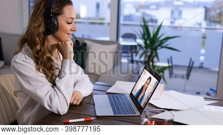 Young Woman At Home Does A Video Chat With Her Friend - Videoclip