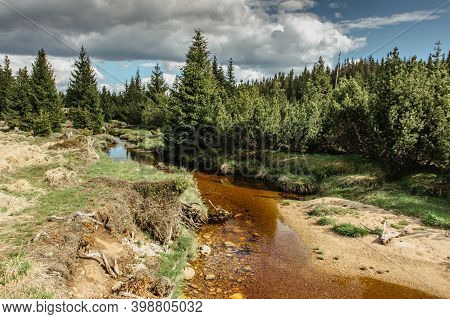 Fall Spring View Of Mountain Landscape, Fresh Cold Stream And Large Meadow At Jizerka Settlement,cze
