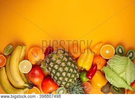 Fruit, Citrus, Vegetables With Vitamin C, Yellow Background Top View. Vitamin C Natural Sources For 