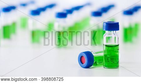 Hplc Vials With Green Sample Of Plant Extracts. Developing Of Drugs Based On Natural Products. Bioch
