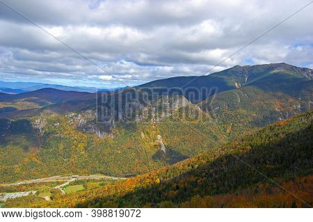 Franconia Notch With Fall Foliage And Highway I-93 Aerial View From Top Of The Cannon Mountain In Fr