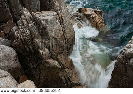 Rock And Sea With A Blurred Wave, Sea Rocky Coastline Telyakovsky Bay Primorsky Krai Russia.