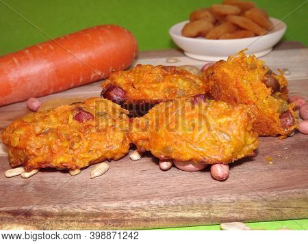 The Process Of Making Carrot Cookies With The Addition Of Dried Apricots, Peanuts And Sunflower Seed