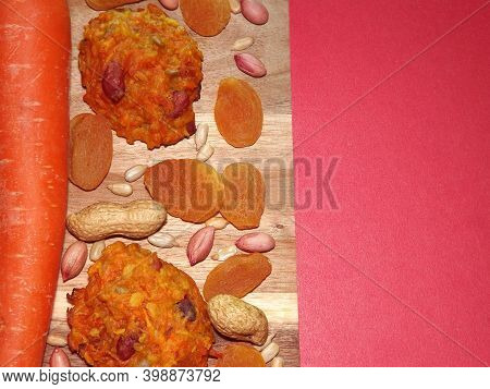 Carrot Diet Cookies With Carrots, Dried Apricots, Peanuts And Sunflower Seeds With Space For Text. H