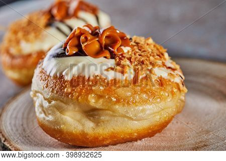 Happy Hanukkah And Hanukkah Sameach Is A Traditional Jewish Donut With Dulce De Leche And Chocolate.