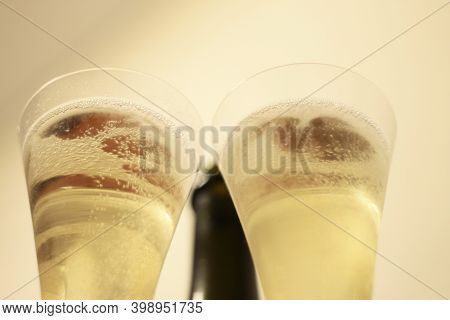 Bottle Of Champagne And A Pair Glasses Before Drinking