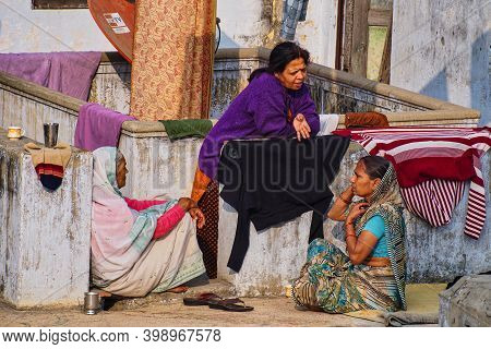 Varanasi, India - Dec 26, 2019: Unidentified Indian Women With Her Colorful Scarf. Scarf Made Of Ind