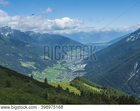 View Over Green Stubai Valley And Neustift Im Stubaital Village From Elferhutte With Moutain Peaks A