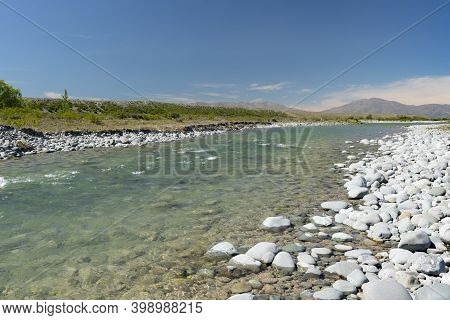 Tepako River Flowing Over Shallow Stony Riverbed.