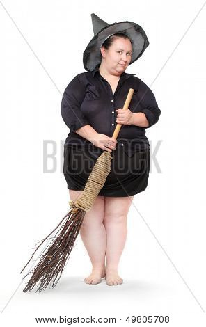 Funny obese witch with her magic broom. Halloween concept. 