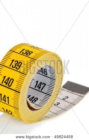 yellow tape measure, symbolic photo for diet control and precision