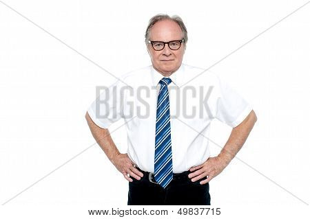 Confident Business Tycoon Striking A Pose