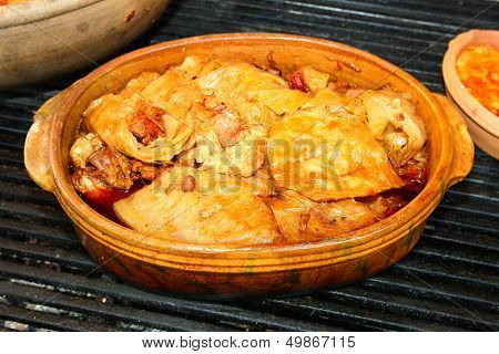 Food Is Served In Ceramic Pots