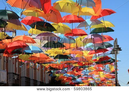 Street decorated with colored umbrellas.Madrid, Spain