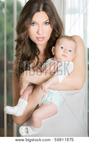 Cute baby with a beautiful mom