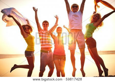 Group of young people at the beach of sea
