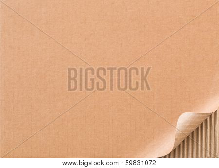 Corrugated cardboard with curled corner