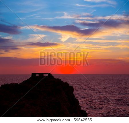 Ciutadella Menorca at Punta Nati orange sunset in Balearic Islands