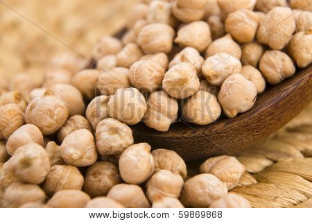 Dried White Chickpeas Ceci On The Wooden Spoon
