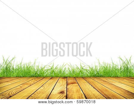 Wooden planks with green grass on white background