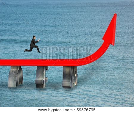 Businessman Running On Growing Red Arrow