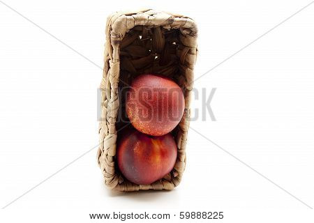 Nectarines with basket