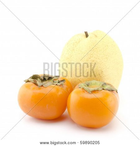 Chinese Pear And Two Persimons Isolated On White
