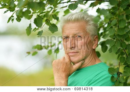 Senior man thinking outddor