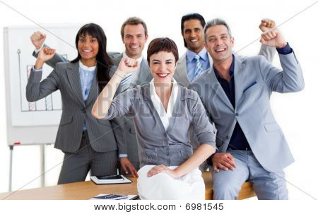 Succesful Business Team Punching The Air In Celebration