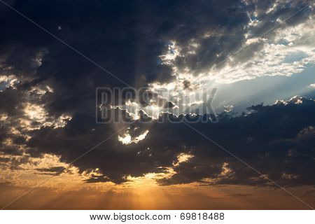 Cloudscape With The Sun Rays Radiating From Behind The Cloud