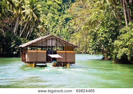 Exotic Cruise Boat With Tourists On A Jungle River. Island Bohol, Philippines.