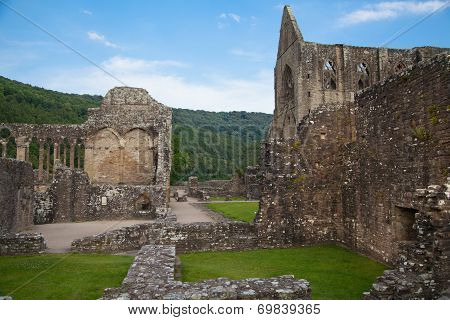 WALES, UK - 26 JULY 2014: Tintern abbey cathedral ruins. Abbey was established at 1131. Destroyed b