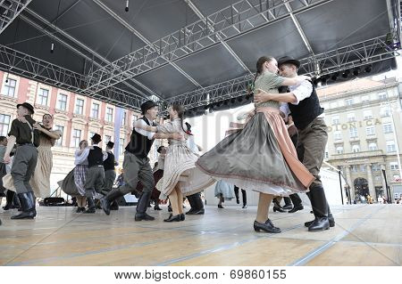 ZAGREB, CROATIA - JULY 19: Members of folk groups Nograd  from Salgotarjan, Hungary during the 48th International Folklore Festival in center of Zagreb, Croatia on July 19, 2014