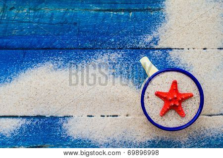 Shell Cup Sand Strewn Blue Boards