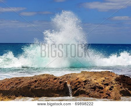 Sea Waves Crashing Against The Rocks