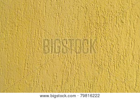 Background texture of yellow. Decorative plaster