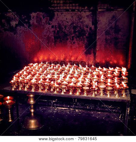 Burning Candles In Buddhist Temple - Vintage Effect.