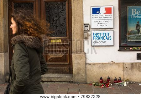 KRAKOW, POLAND - JAN 11, 2015: Action near the facade of the Consulate General of France in Krakow solidarity for the victims of the Charlie Hebdo attacks in Paris.