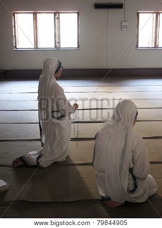 KOLKATA, INDIA - JANUARY 27: Sisters of Mother Teresa's Missionaries of Charity in prayer in the chapel of the Mother House, Kolkata, India at January 27, 2009