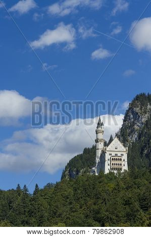 Neuschwanstein Castle Amongst Green Trees, Bavarian Alps.