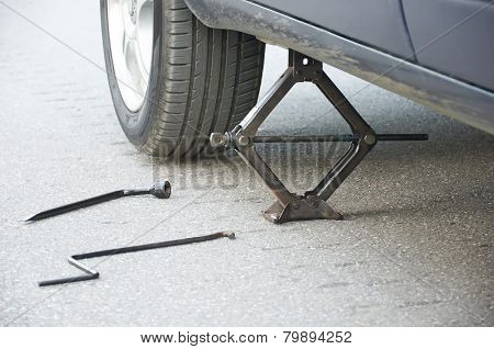Changing The Car Wheel On The Road