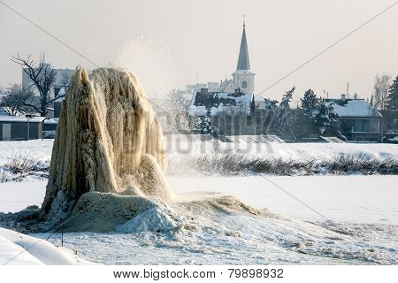 Winter geyser on sludge fields