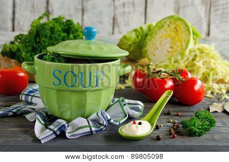 Shchi - Traditional Russian Cabbage Soup On A Wooden Table