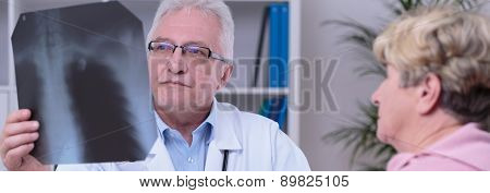 Medic Looking At Chest X-ray