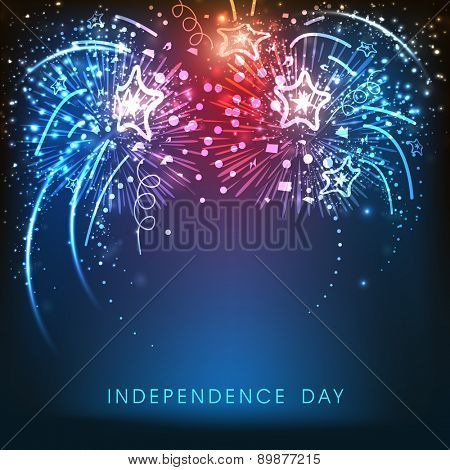 Shiny firecrackers in national flag colors on blue background for American Independence Day celebration.