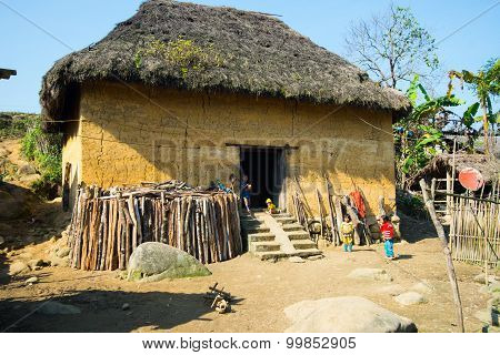 Hani ethnic minority people near their traditional house in Laocai, Vietnam