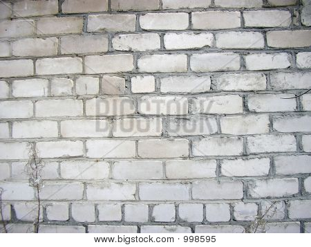 Le vieux mur de briques.