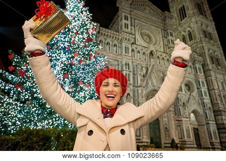 Happy Woman Rejoicing Near Christmas Tree In Florence, Italy